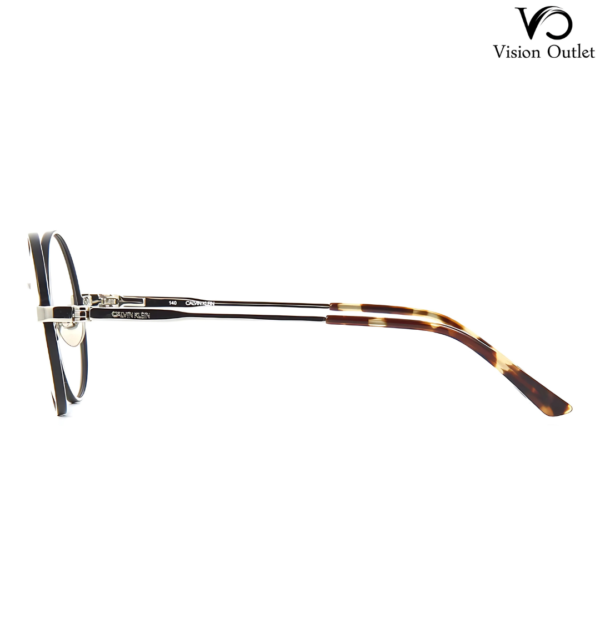 Calvin Klein CK19114 045 round eyeglasses featuring a black and silver full-rim metal frame, designed for unisex style and all-day comfort.