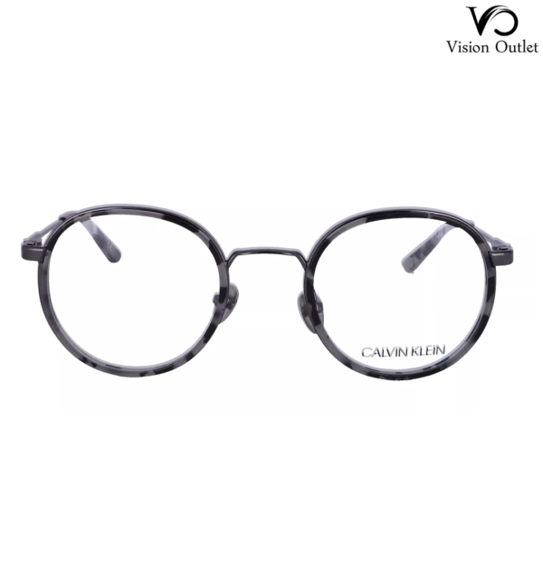 Calvin Klein CK18107 071 round eyeglasses in smoke tortoise, featuring a metal and plastic frame with a 47 mm lens width and included case.